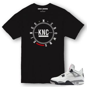 Kings N Crowns Tee shirt to match Jordan 4 White Cement Sneakers.