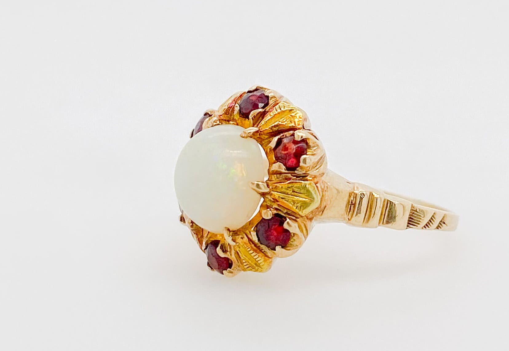 14 karat yellow gold Opal and Garnet ring