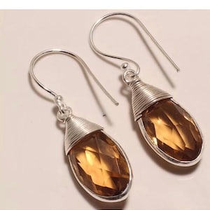 Sterling Silver faceted yellow quartz gemstone pear shape dangle earrings 1.5&quot; length.