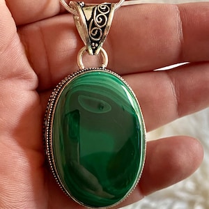 Malachite green genuine gemstone handmade Bali pendant set in 925 sterling silver with choice length sterling snake chain.