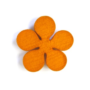 May include: A bright orange felt flower with five petals. The flower is cut out in a simple, classic shape.