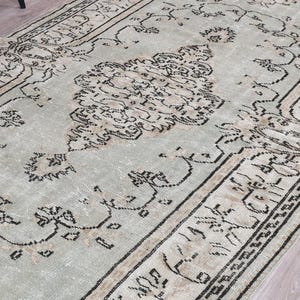 Handmade Turkish Wool Rug 5x9: Distressed Vintage Anatolian Rug