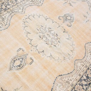 6x10 Vintage Turkish Wool Rug: Handmade Muted Area Rug