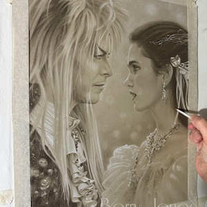 May include: A black and white drawing of two people looking at each other. The man has long, flowing hair and is wearing a dark jacket. The woman has long, straight hair and is wearing a white dress. The drawing is signed "Barry Jones".