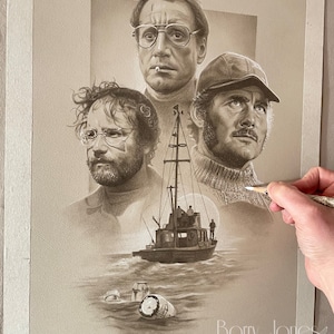 May include: A black and white pencil drawing of four men from the film Jaws. The men are standing in front of a boat and the ocean. The drawing is signed "Barry Jones".