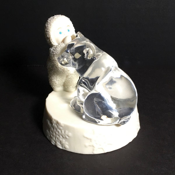 Department 56 Snowbabies Figurine is the "Thursday" Baby from the "A Baby For Everyday" Series titled "Secret Keeper"