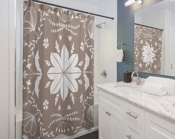 May include: A brown shower curtain with a white floral pattern. The pattern features stylized flowers, leaves, and stems.