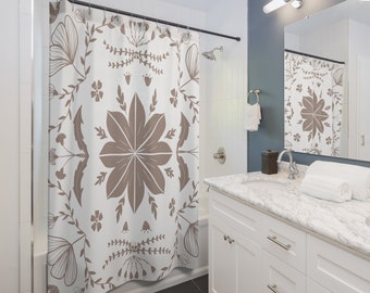 May include: A white shower curtain with a brown floral pattern. The pattern features stylized flowers, leaves, and vines. The shower curtain is hanging in a bathroom with a white vanity and a marble countertop.