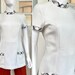 see more listings in the Tops/Blouses/Shirts section