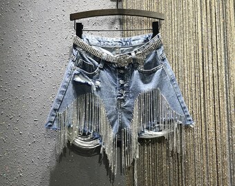 ripped shorts with chains