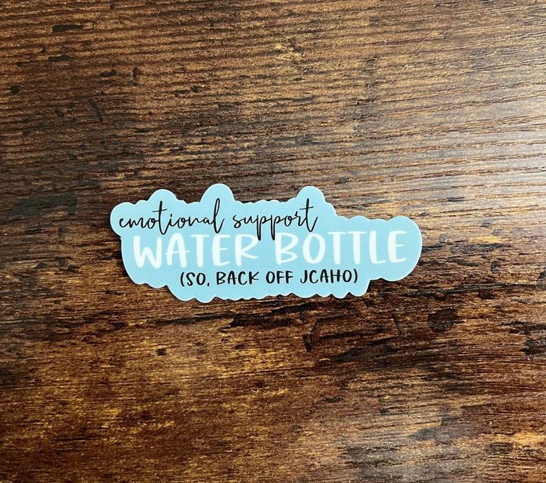 May include: A light blue sticker with the text "emotional support water bottle (SO, BACK OFF JCAHO)"