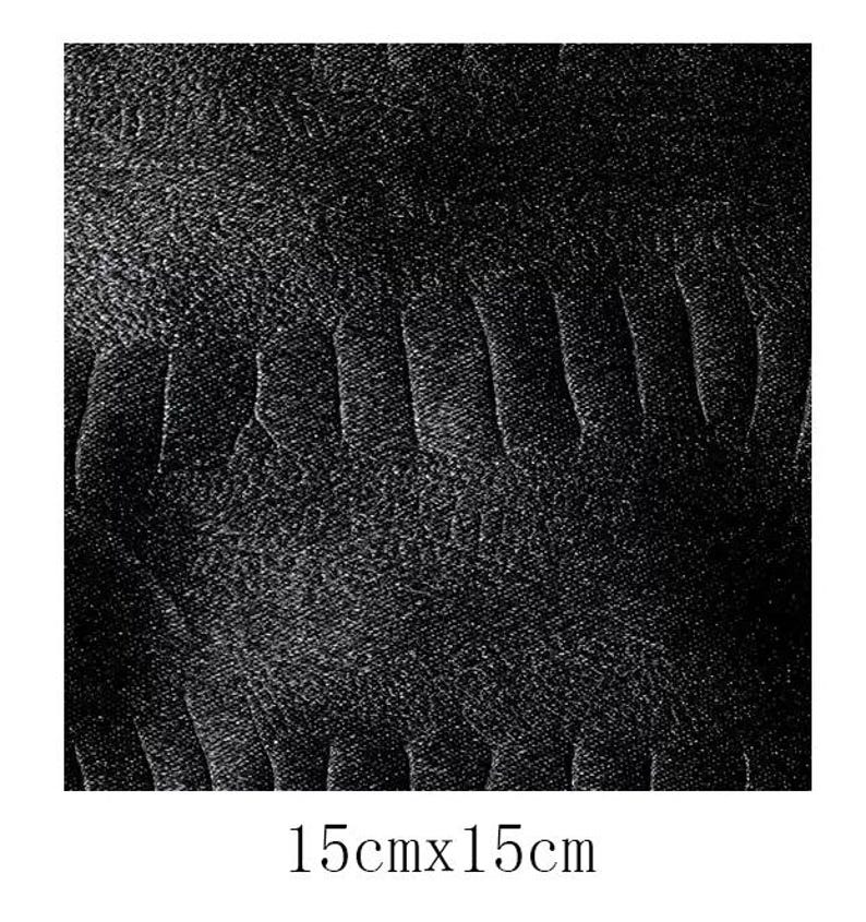 May include: A black and white textured fabric with a subtle pattern. The fabric is 15 inches by 15 inches.