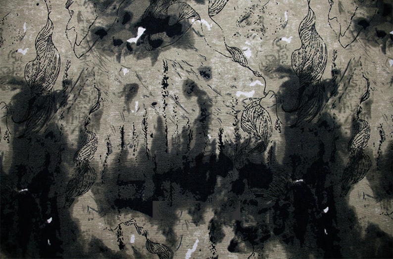 May include: Abstract black and white patterned fabric with a textured surface. The fabric has a subtle gray background with black and white patterns.