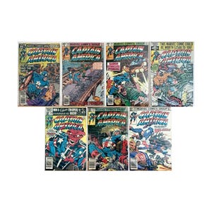 Peut inclure: Une collection de sept bandes dessinées vintage Marvel Comics Group Captain America. Chaque couverture présente des illustrations d'action colorées de Captain America dans son costume bleu, blanc et rouge, avec des titres en gras et des numéros.