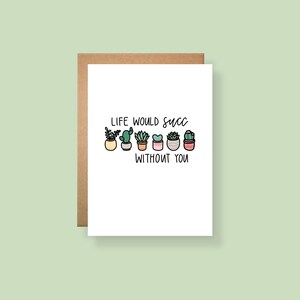 May include: A white greeting card with a brown envelope featuring a hand-drawn illustration of six colourful potted succulents and cacti. The text printed in black ink reads: LIFE WOULD SUCC WITHOUT YOU, positioned above and below the plant drawings.