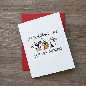 C'est Be-KITTEN qui ressemble beaucoup à une carte de Noël, vacances