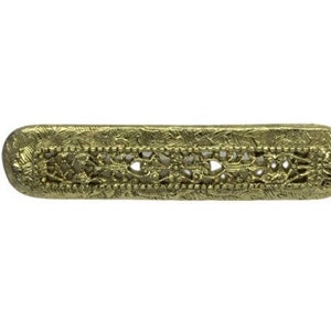 May include: A gold-coloured metal decorative trim with an intricate floral design.