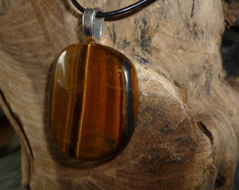 Colgante de ojo de tigre/colgante de piedra de disco/piedra curativa+una correa de cuero de aproximadamente 60 cm de largo. Tiger Eye otorga valor, protección y seguridad.