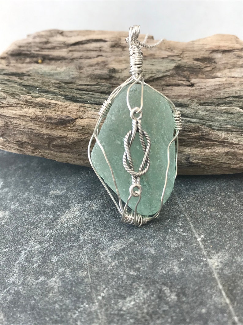 Sea glass pendant with sterling silver