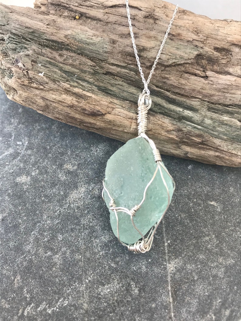 Sea glass pendant with sterling silver