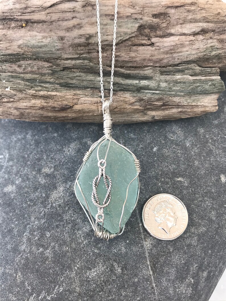 Sea glass pendant with sterling silver
