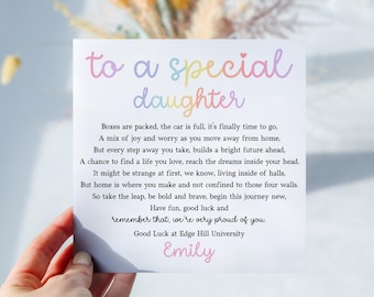 May include: A square card with a pastel rainbow header that reads "to a special daughter." The card contains a poem and the words "Good Luck at Edge Hill University" and "Emily."