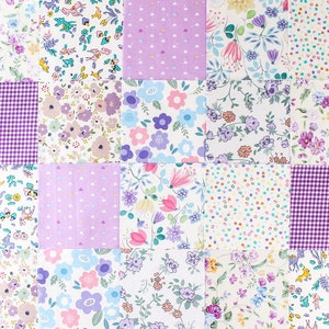May include: A patchwork quilt with a variety of floral patterns in shades of purple, pink, and blue. The quilt is made up of squares of different fabrics, each with a unique design.