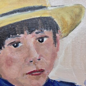 May include: Oil painting portrait of a person wearing a yellow hat and a blue shirt. The person has dark hair and is looking at the viewer. The painting has a soft, painterly style.