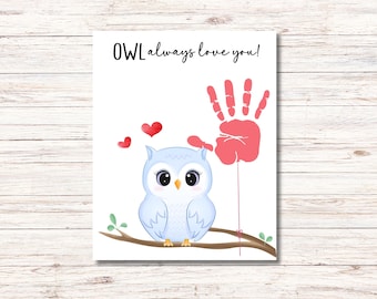 May include: A white card with the text "OWL always love you!" in black. A blue owl with red hearts and a red handprint are on the card.