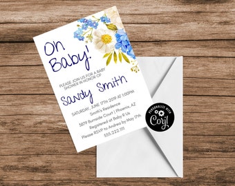 May include: A white baby shower invitation with blue and white flowers. The invitation reads "On Baby!" and includes the text "Please join us for a baby shower in honor of Sandy Smith. Saturday, June 17th 2019 at 1:00PM. Smith's Residence. 3879 Burnside Court | Phoenix, AZ. Registered at Baby R Us. Please RSVP to Andrea by May 17th. 555.222.1111."