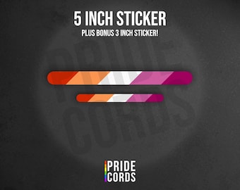 May include: Two stickers with a lesbian pride flag design. The larger sticker is 5 inches long, and the smaller one is 3 inches long. The stickers have a gradient of colors, including red, orange, white, and pink. The text "5 INCH STICKER" and "PLUS BONUS 3 INCH STICKER!" is at the top.