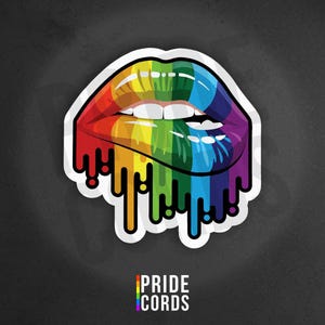 May include: A sticker featuring a stylized illustration of rainbow-colored lips with dripping paint effect. The lips are outlined in white and set against a dark gray background. The text "PRIDE CORDS" is at the bottom.