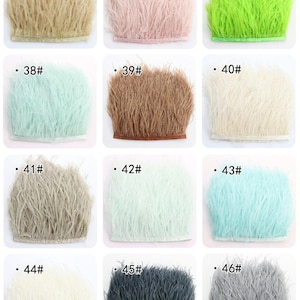 Puede incluir: Surtido de 12 galones de plumas en varios colores, incluyendo beige, rosa, verde, azul claro, marr&oacute;n, blanco, gris y negro. Cada gal&oacute;n est&aacute; etiquetado con un n&uacute;mero del 35 al 46.