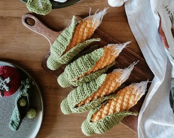 Mais häkeln. Stellen Sie sich vor, Sie spielen Essen, spielen Küchenzubehör für Kinder. Spielplatz, Laden, Lebensmittelgeschäft. Geburtstagsgeschenk für Kleinkinder, Gemüse kochen.