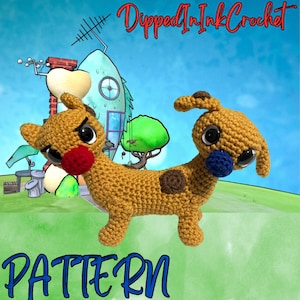 May include: Crochet pattern for a two-headed dog with brown and tan fur, brown spots, and blue and red noses. The dog is sitting on a green grassy surface with a cartoon house in the background. The text "Dipped In Ink Crochet" is at the top of the image and the text "PATTERN" is at the bottom of the image.