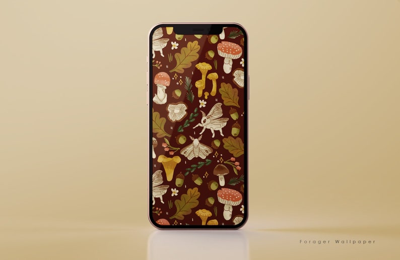 May include: A phone screen displaying a digital wallpaper with a pattern of mushrooms, moths, acorns, and leaves on a dark red background. The wallpaper is titled "Forager Wallpaper".