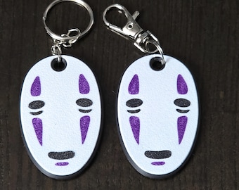 Llavero Sin Rostro / Colgante de doble cara Kaonashi / Accesorio resistente y texturizado para mochilas / Colgante duradero inspirado en el anime / Gancho a presión