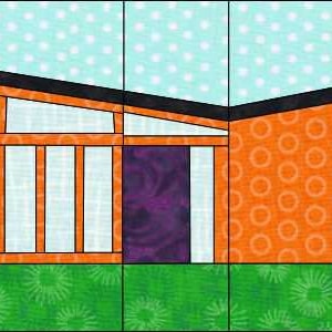 May include: A colorful paper pieced quilt block featuring a stylized house with a flat roof, orange walls, a purple door, and a blue and white polka dot background.