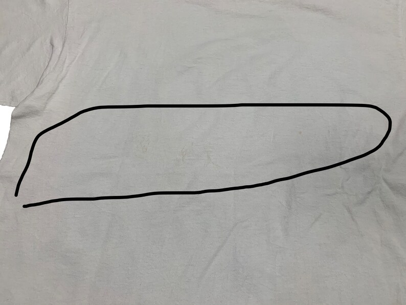 May include: A light gray t-shirt with a slightly wrinkled texture. The shirt is plain and has a simple design, suitable for casual wear. The fabric appears to be soft and lightweight.