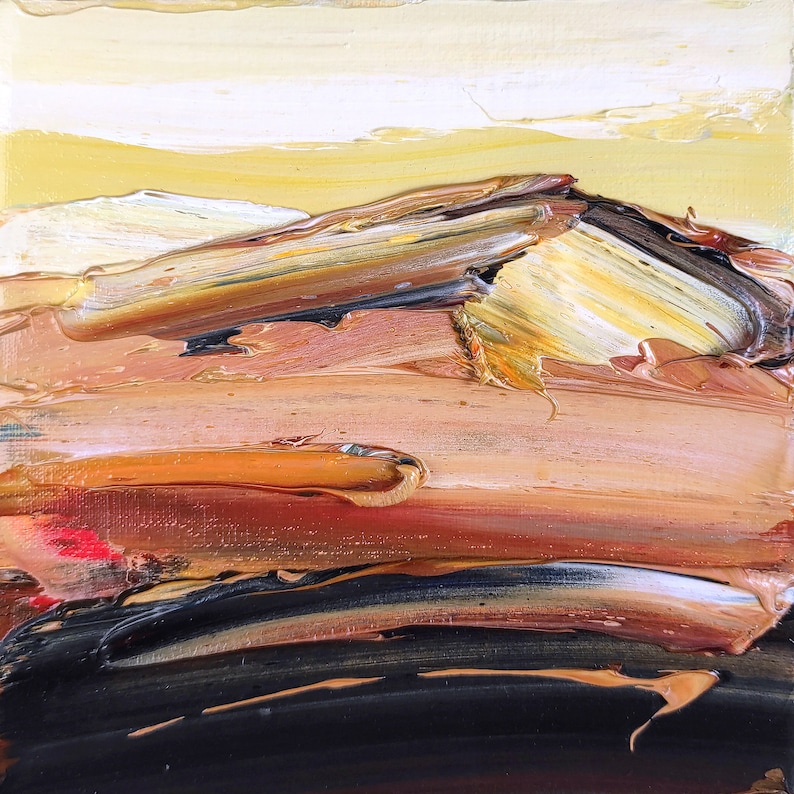 May include: Square canvas art with thick brushstrokes. The painting features a landscape with a mountain range in shades of brown, orange, and yellow. The sky is a pale yellow with white highlights. The bottom of the painting is dark brown.