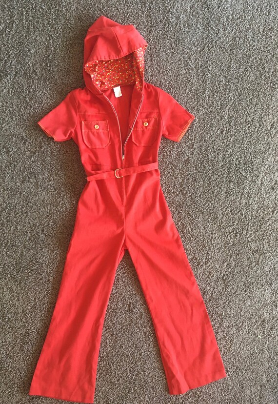 red zip up jumpsuit