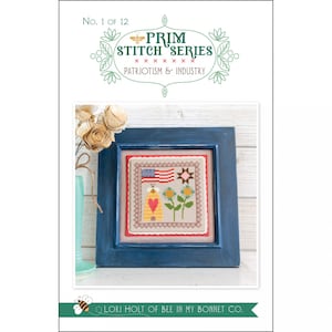 May include: A framed cross-stitch pattern featuring a beehive, a heart, a sunflower, and an American flag. The title "Prim Stitch Series" is above the image, and the text "Patriotism & Industry" is below the image. The text "Lori Holt of Bee in My Bonnet Co." is at the bottom of the image.