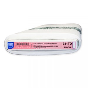 May include: A white roll of 931TD Pellon™ Fusible Midweight fabric for apparel basics. The label reads "100% Polyester, Machine wash warm and tumble dry or dry clean, www.PellonProjects.com, 20 in, 2012, Made in USA."