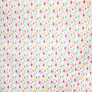 May include: A white background with a repeating pattern of colorful raindrops. The raindrops are in shades of pink, orange, yellow, and blue.