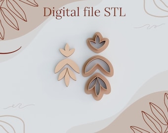 Pode incluir: Arquivo digital STL para um conjunto de dois cortadores de biscoitos em forma de folha. Os cortadores são feitos de madeira marrom e estão dispostos verticalmente em um fundo branco. O cortador superior é uma única forma de folha, enquanto o cortador inferior é uma forma de folha de três peças.
