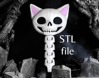 May include: A white cat skull design with pink inner ears and a spine-like structure. The image includes the text "STL file" in white. The background is a dark, gothic-themed setting with tombstones.