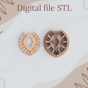 May include: Two brown wooden cookie cutters in the shape of a heart with a geometric design. The text "Digital file STL" is at the top of the image.