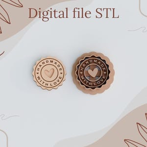 May include: Two wooden cookie cutters, one with a raised edge, both with the text "Handmade with Love" and a heart shape in the centre.