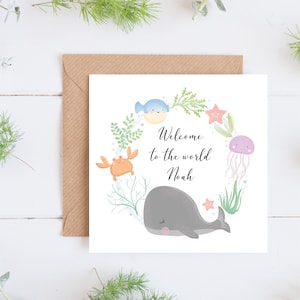 Nuevo bebé, tarjeta personalizada, hecha a mano, ballena bebé, vida marina, estrella de mar, medusa