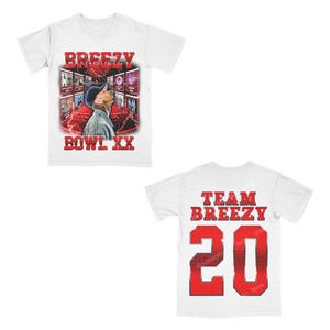 May include: Two white t-shirts with red text and graphics. The first shirt features a graphic of a man wearing a baseball cap and the text "Breezy Bowl XX". The second shirt features the text "Team Breezy 20".